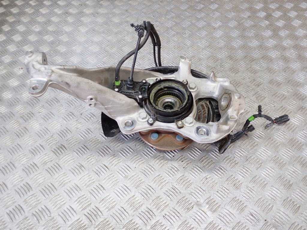 Zwrotnica lewa przednia do Ford F150 3.5 2021- z piastą, część samochodowa marki Autolandparts, widoczna z przodu pojazdu