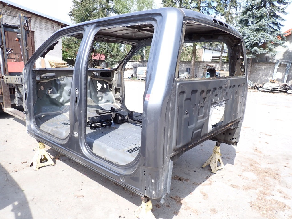 Ćwiartka tylna lewa słupek tylny do Ford F150 XLT 2021- od Autolandparts, widoczny fragment karoserii pojazdu.