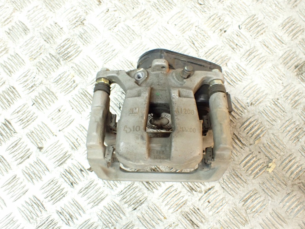 Zacisk Tylny Elek. Chevrolet Tahoe Suburban Cadillac Escalade GMC Yukon 21-