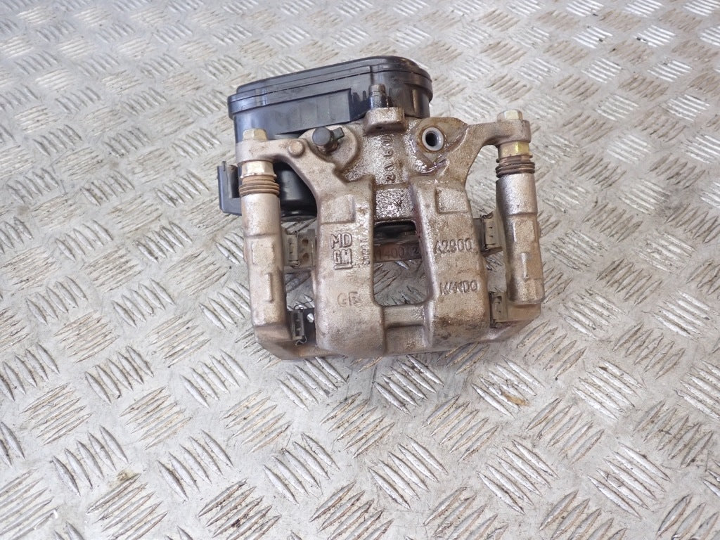 Zacisk Tylny Elek. Chevrolet Suburban Tahoe Cadillac Escalade GMC Yukon 21-