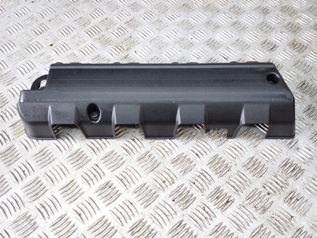 Left-hand valve cover trim for the 2014– Chevrolet Corvette C7 Z51 – in black, made from durable materials, featuring the Autolandparts logo