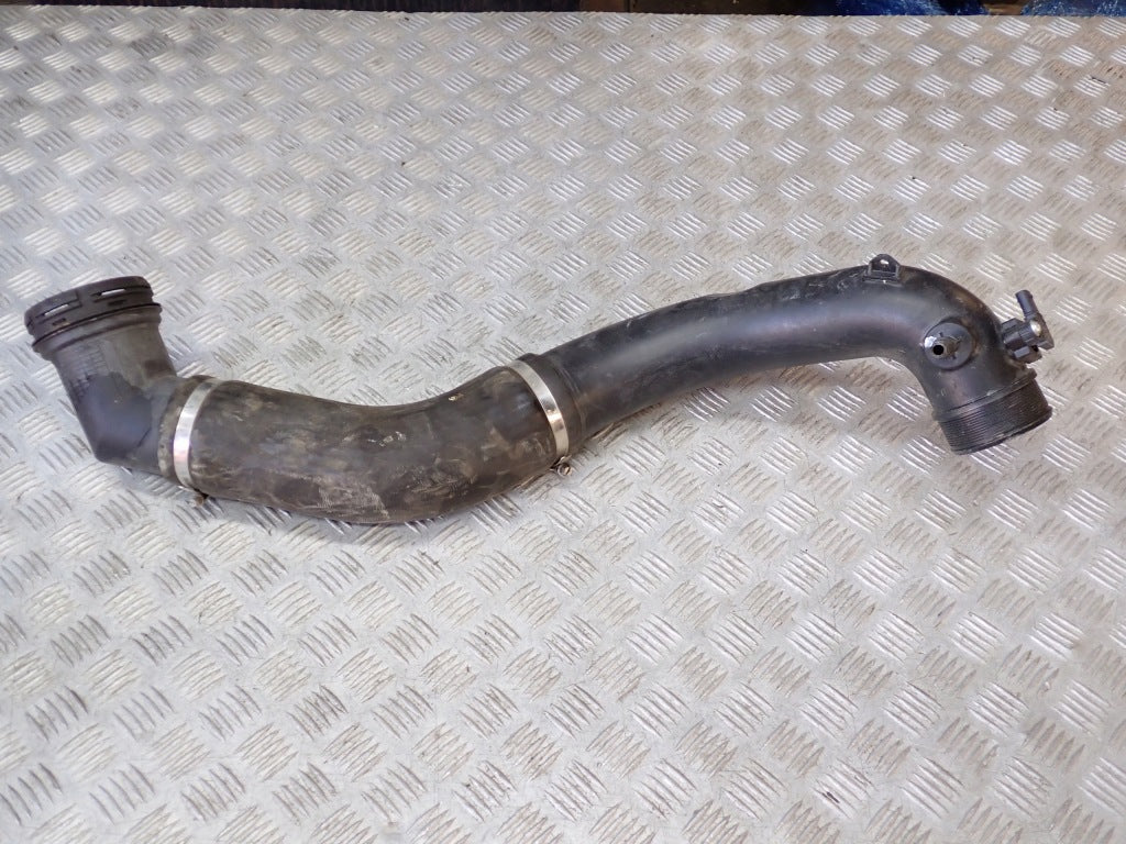 Rura przewód powietrza do Ford F150 3.5 2021, autolandparts, z widocznymi elementami układu powietrza i połączeniami