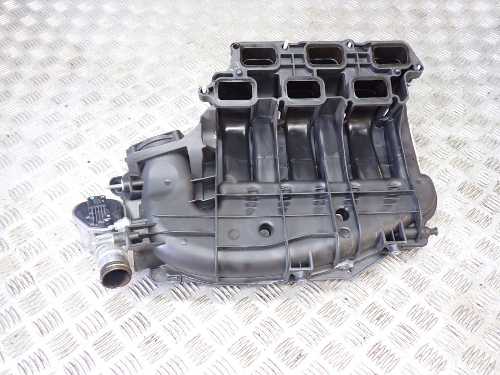 Kolektor ssący do Jeep Grand Cherokee WL 3.6 V6, część samochodowa marki Autolandparts, widoczny na zdjęciu.