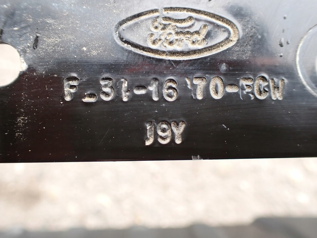 Lewy próg stopnia do Ford F150 Crew Cab 2025 marki Autolandparts, widoczny w widoku z boku i teksturą powierzchni.