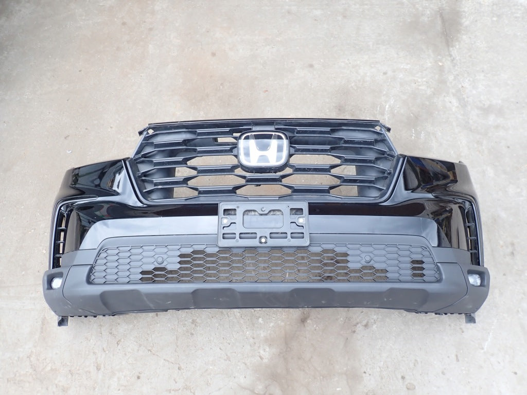 Zderzak przedni z atrapą halogenów i PDC do Honda Pilot 4Y 2023, część marki Autolandparts, widoczna z przodu samochodu