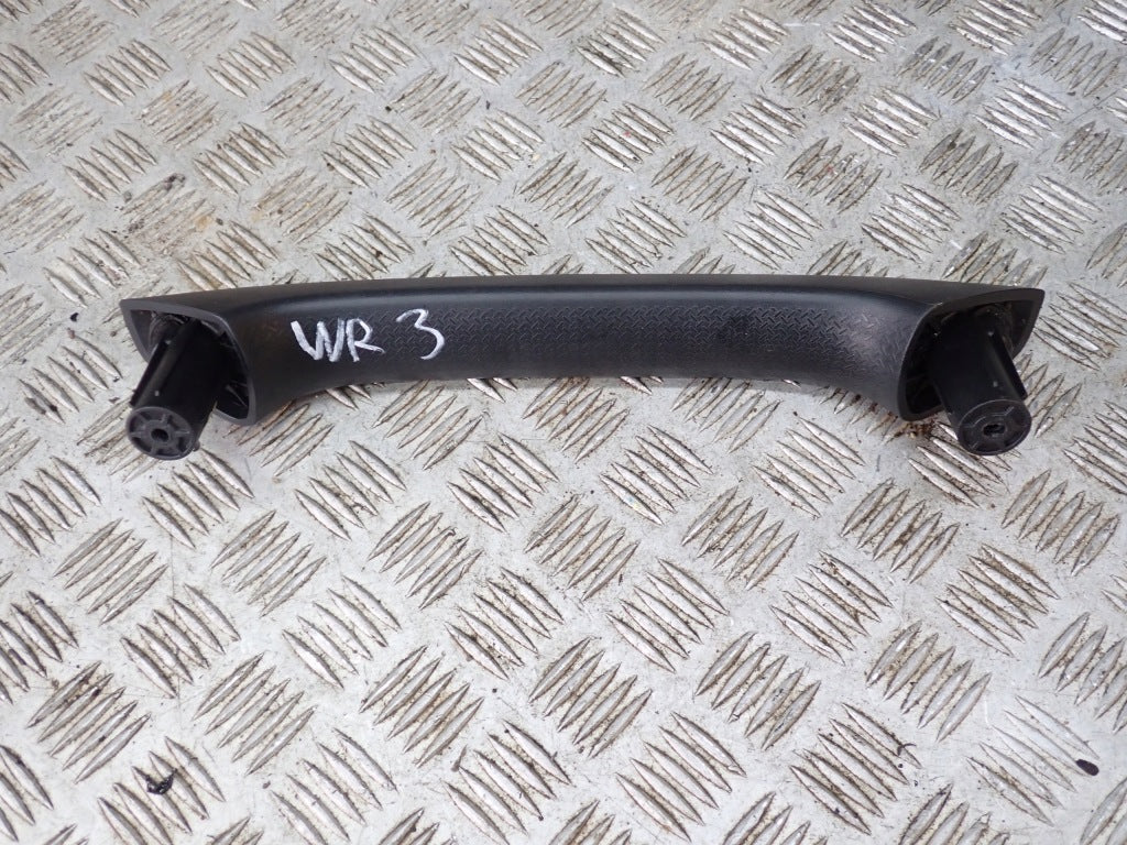 Autolandparts 2012 Jeep Wrangler JK dashboard console handle, black, for fitting to the vehicle’s dashboard.