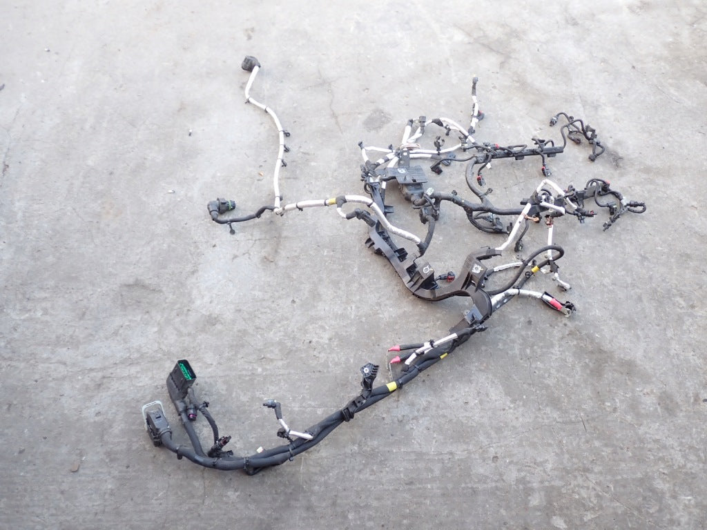 The Jeep Grand Cherokee WL 3.6 V6 engine wiring harness, a product from Autolandparts, as shown in the photograph, including cables and connectors.