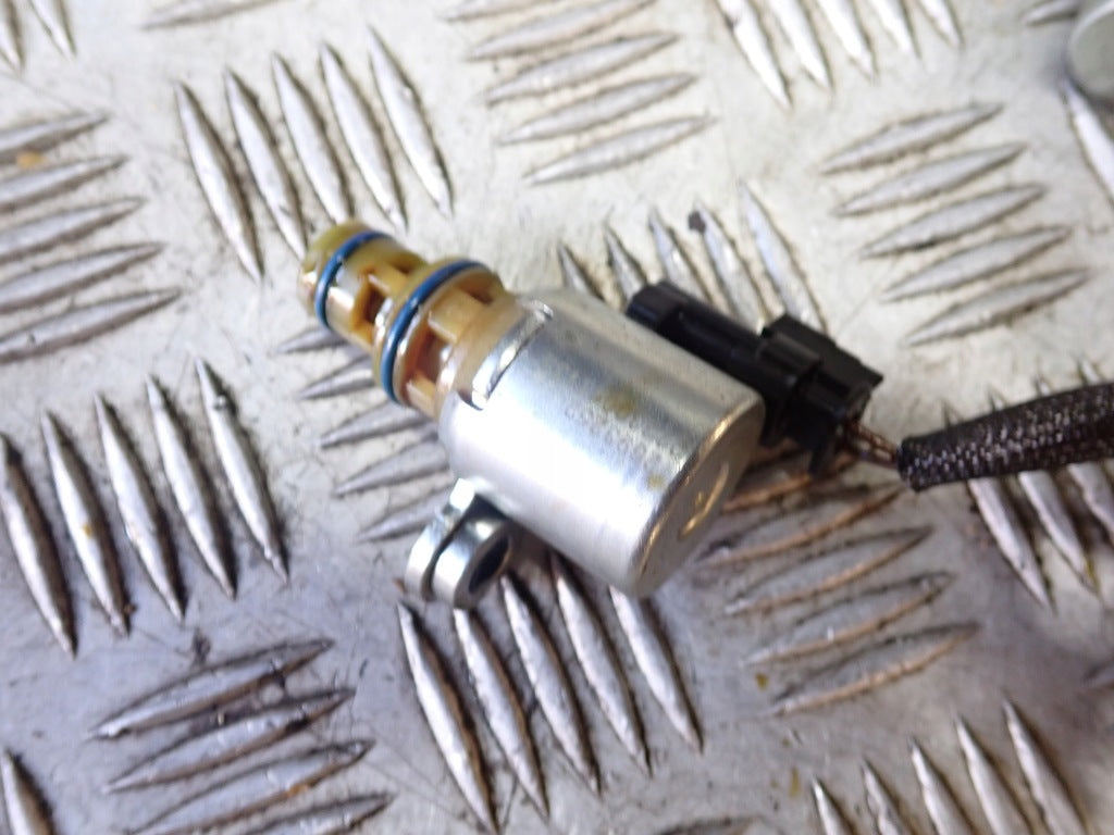 Autolandparts oil pressure solenoid valve for the 2021 Chevrolet Tahoe and Suburban L84 5.3, as shown in the photo.